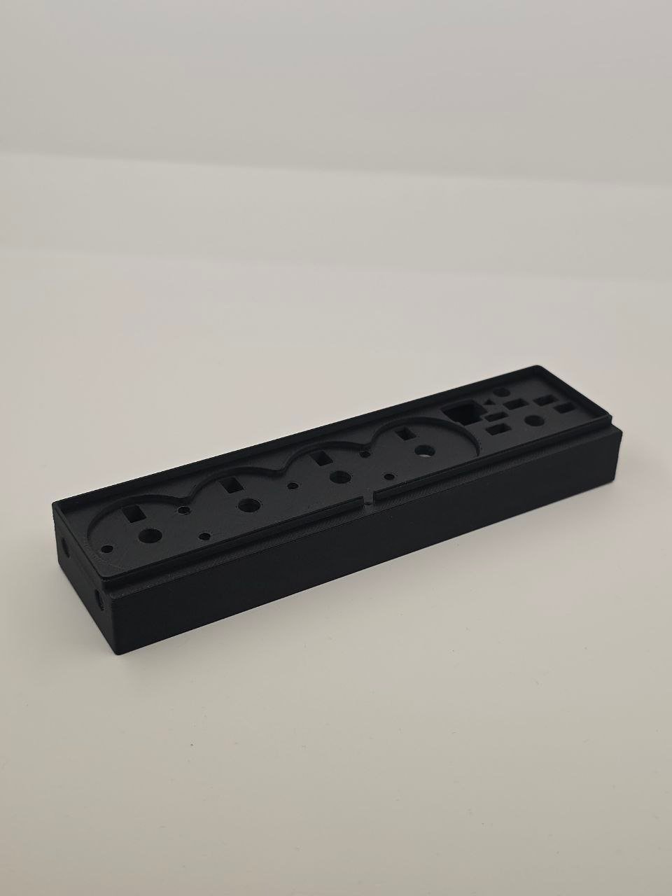 custom 3D printed electronics enclosure Miami — rectangular housing, Rectangular component, Mounting or housing plate, Outlet strip housing, Electrical component housing, Enclosure or Mounting Bracket (photo 5)