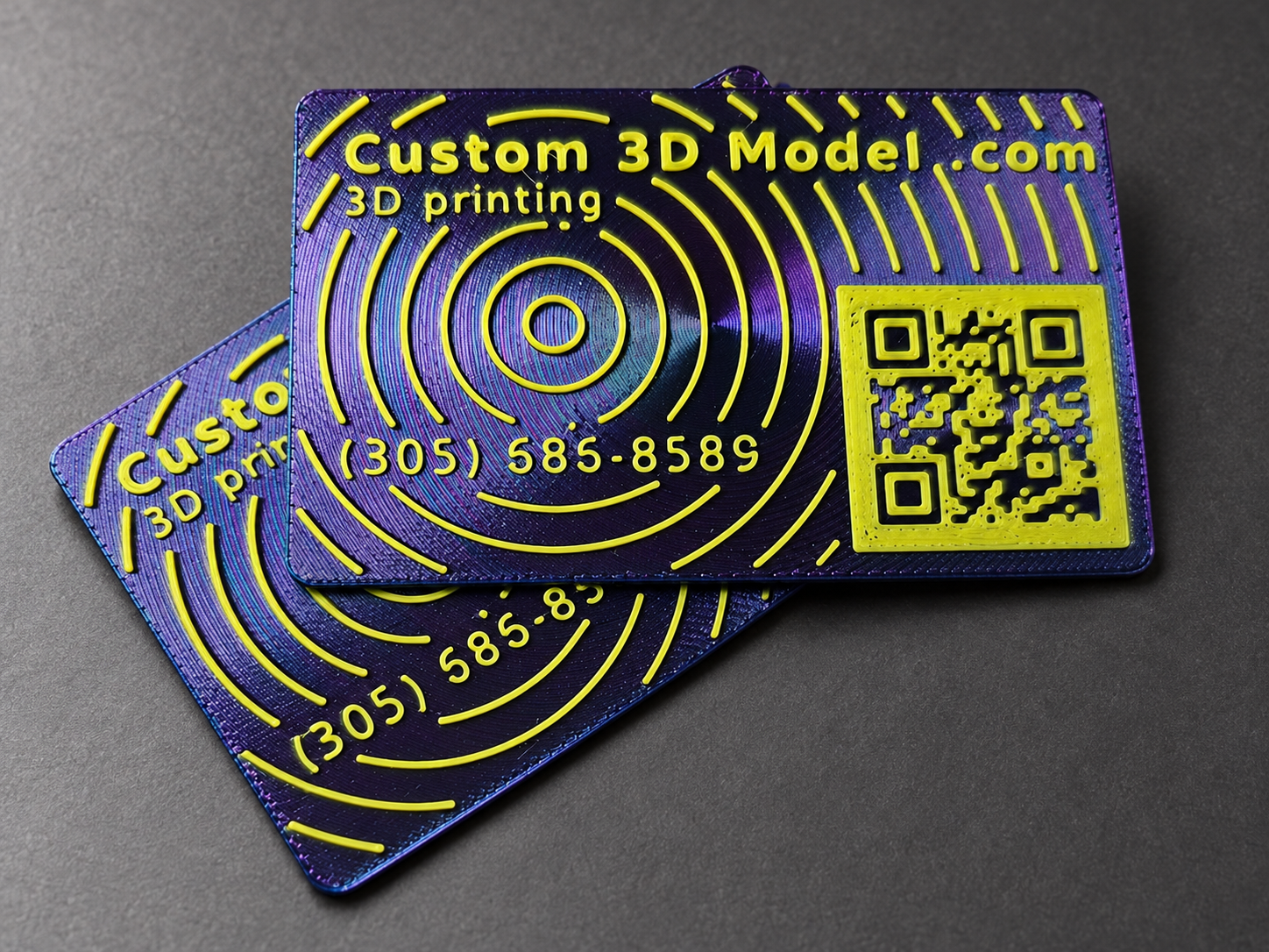 Custom 3D printed business cards with dimensional lettering and distinctive design